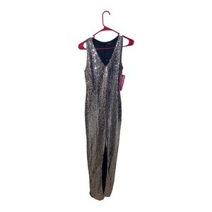 Brand sequined gown beautiful size large but fits like med.